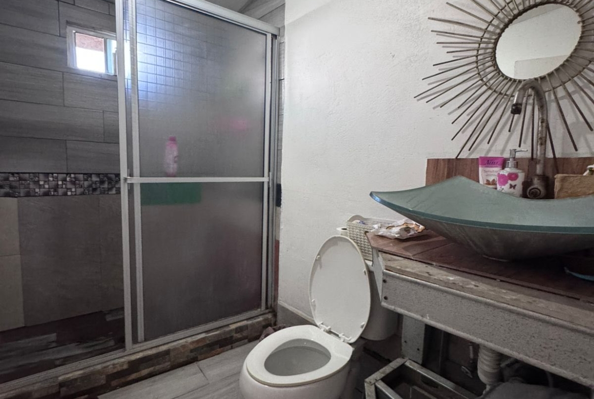 CASA EN VENTA EN MANEADERO PARTE BAJA